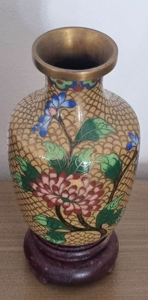 Cloisonne floral flower gold colour vase with wooden stand, stamped CHINA at the bottom.