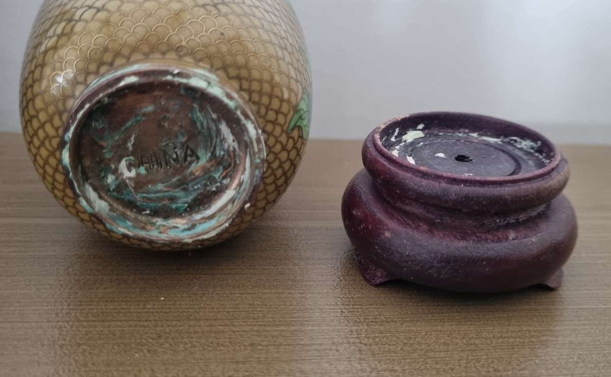 Cloisonne floral flower gold colour vase with wooden stand, stamped CHINA at the bottom.