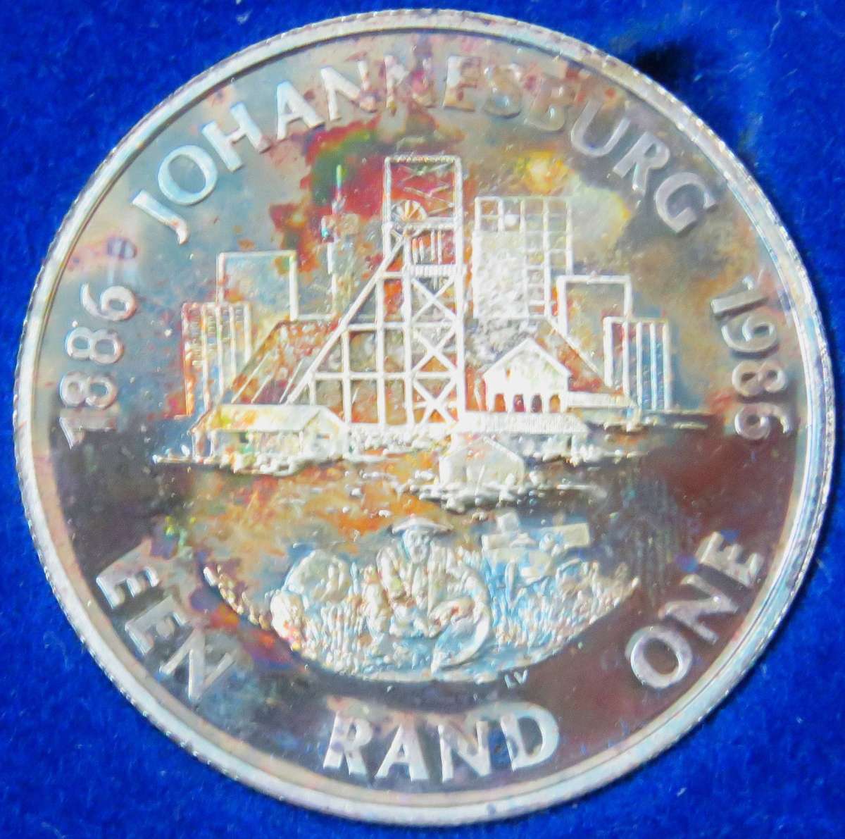1986 Silver 1 Rand JOHANNESBURG proof in SAM box-Lovely toning
