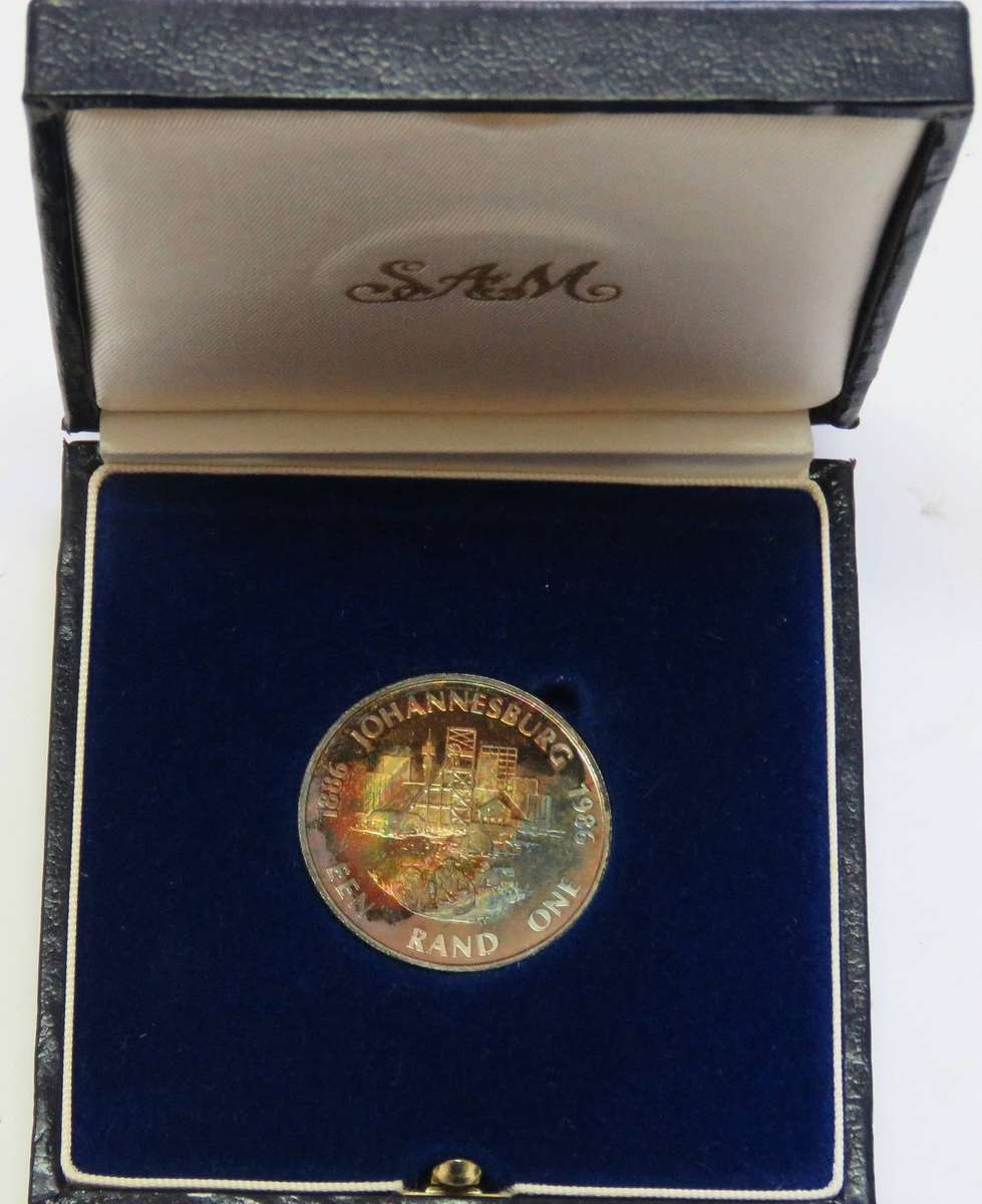 1986 Silver 1 Rand JOHANNESBURG proof in SAM box-Lovely toning