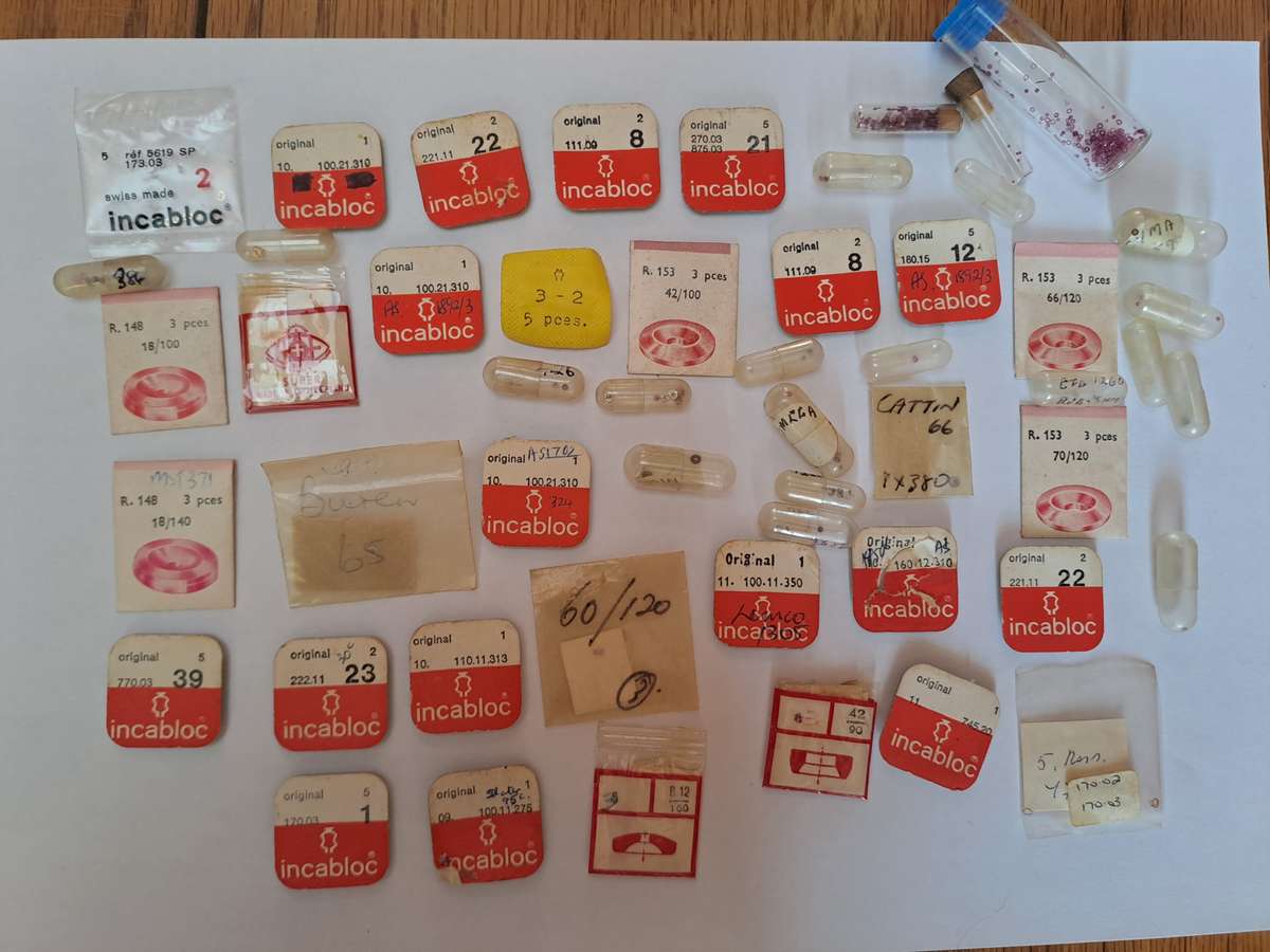 Lot of watch spares jewels springs settings Incabloc Favotite etc as per pictures