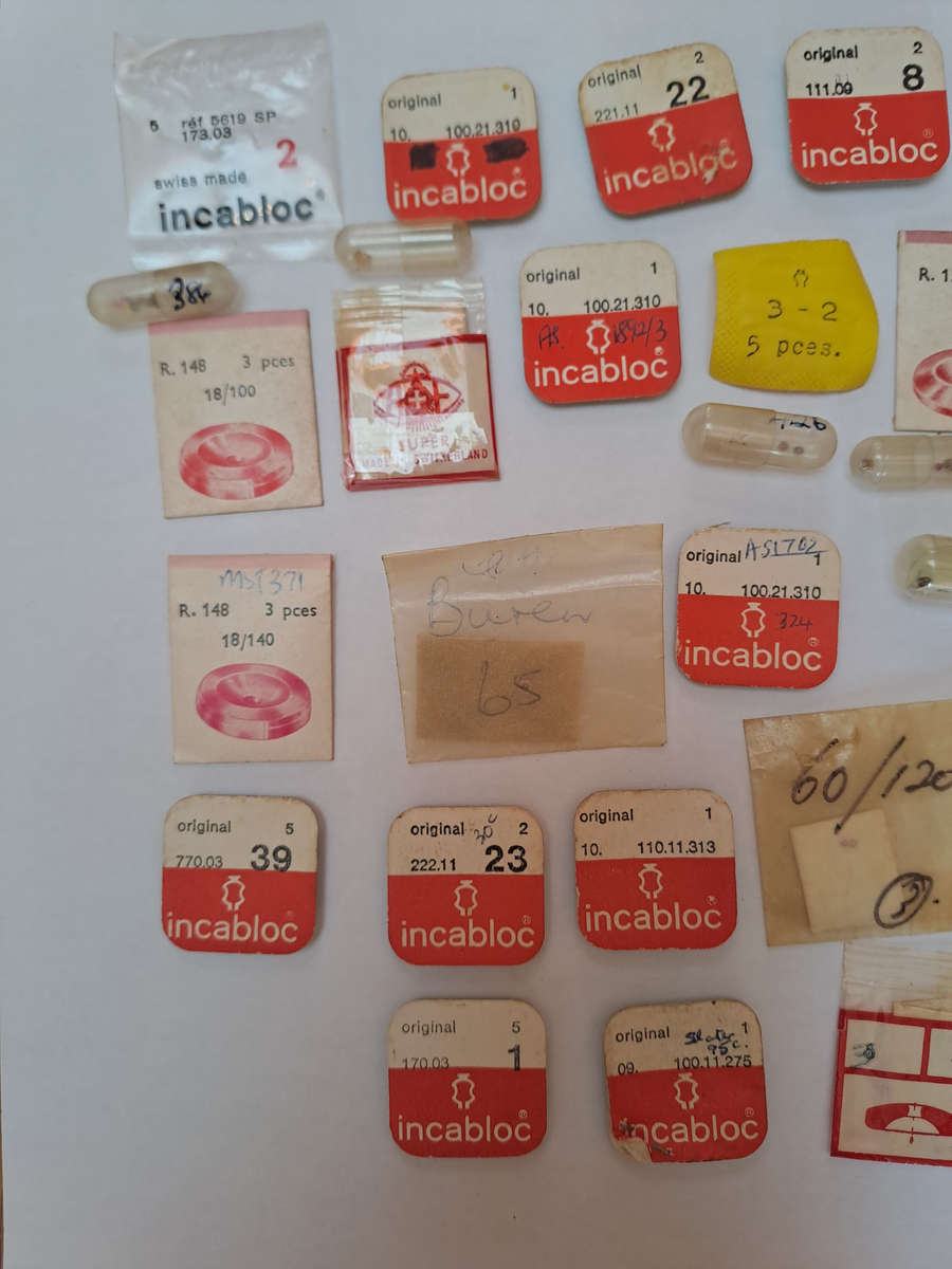 Lot of watch spares jewels springs settings Incabloc Favotite etc as per pictures
