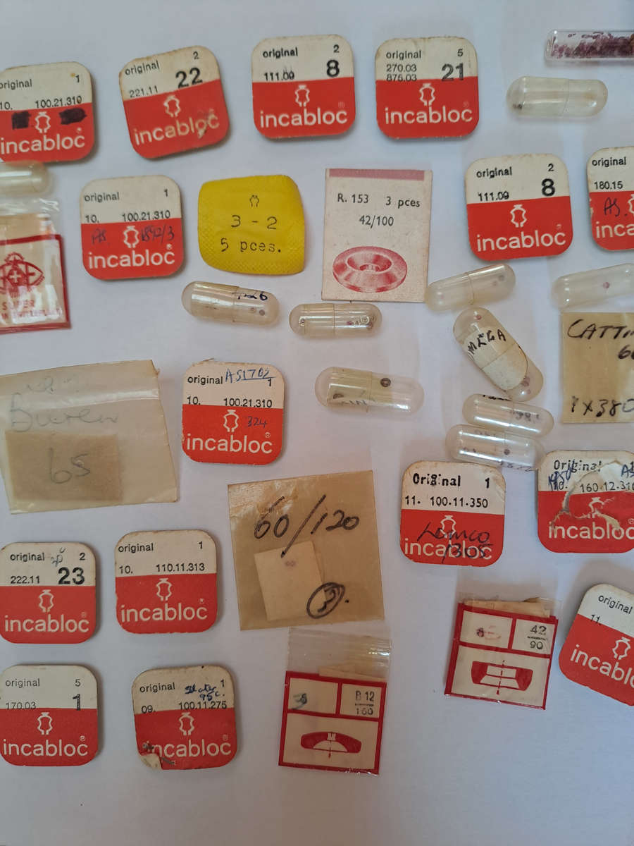 Lot of watch spares jewels springs settings Incabloc Favotite etc as per pictures