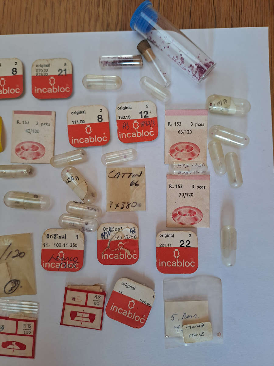 Lot of watch spares jewels springs settings Incabloc Favotite etc as per pictures