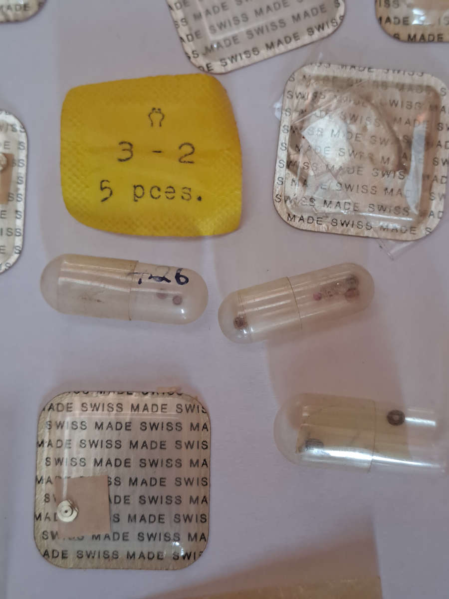 Lot of watch spares jewels springs settings Incabloc Favotite etc as per pictures