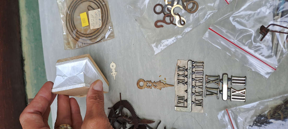 large lot of Cuckoo clock parts, chains, bellows, hands, etc