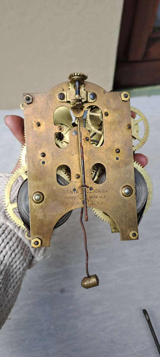 Ansonia open escarpment clock movement looks complete