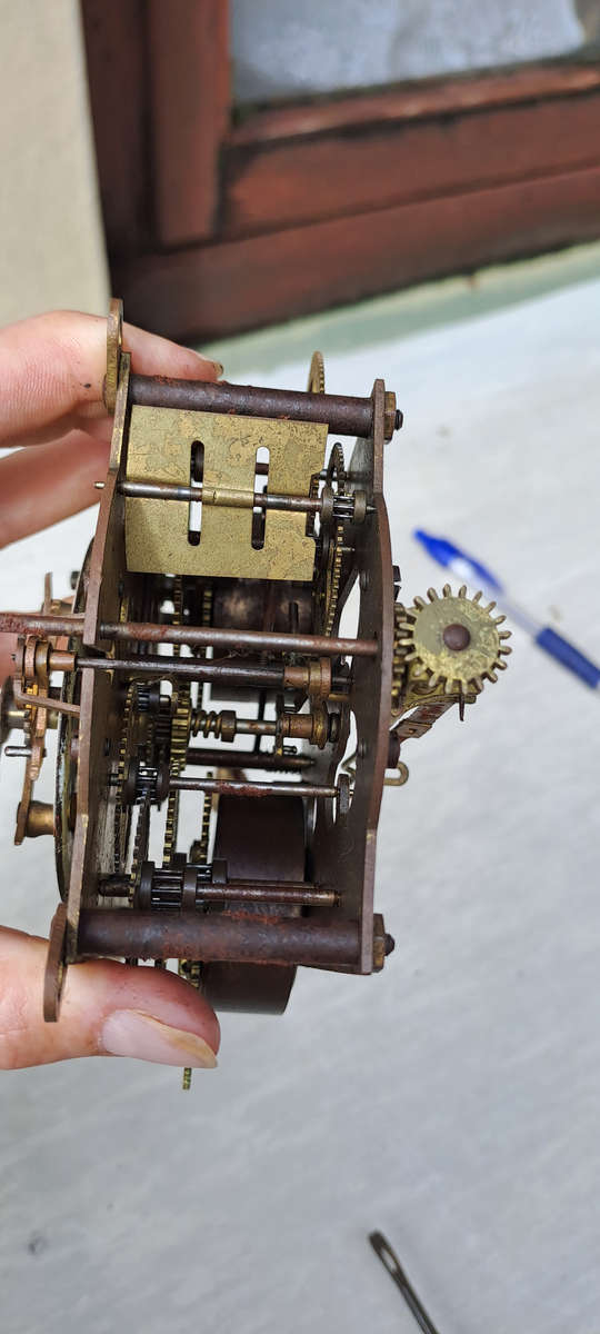 Ansonia open escarpment clock movement looks complete