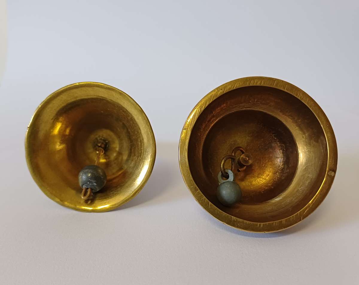 two small brass bells
