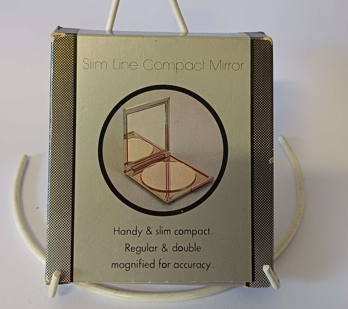 make-up mirror in chrome casing