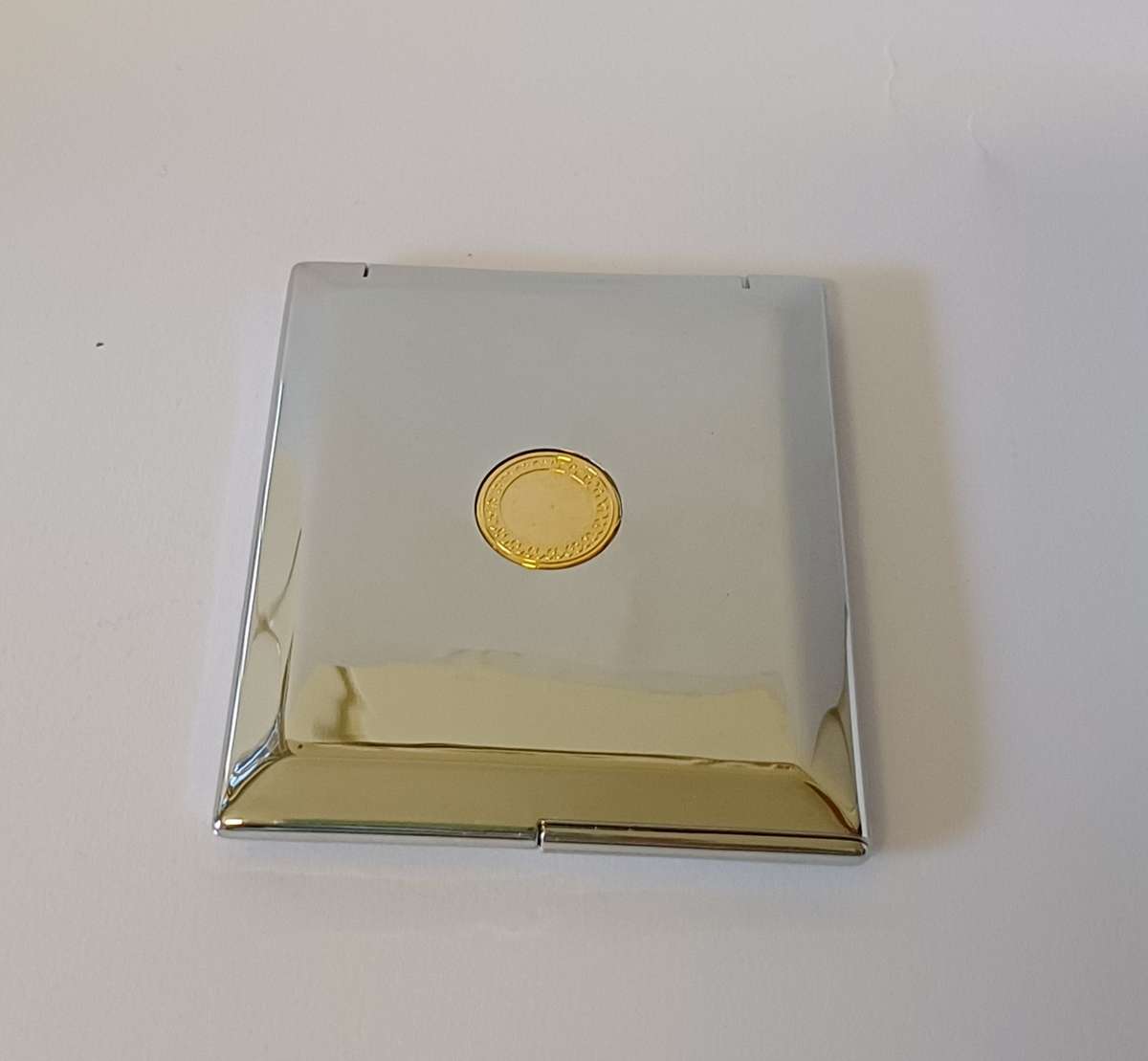 make-up mirror in chrome casing