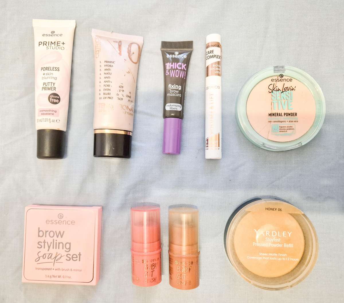 Assorted Brands Make-Up + Bag