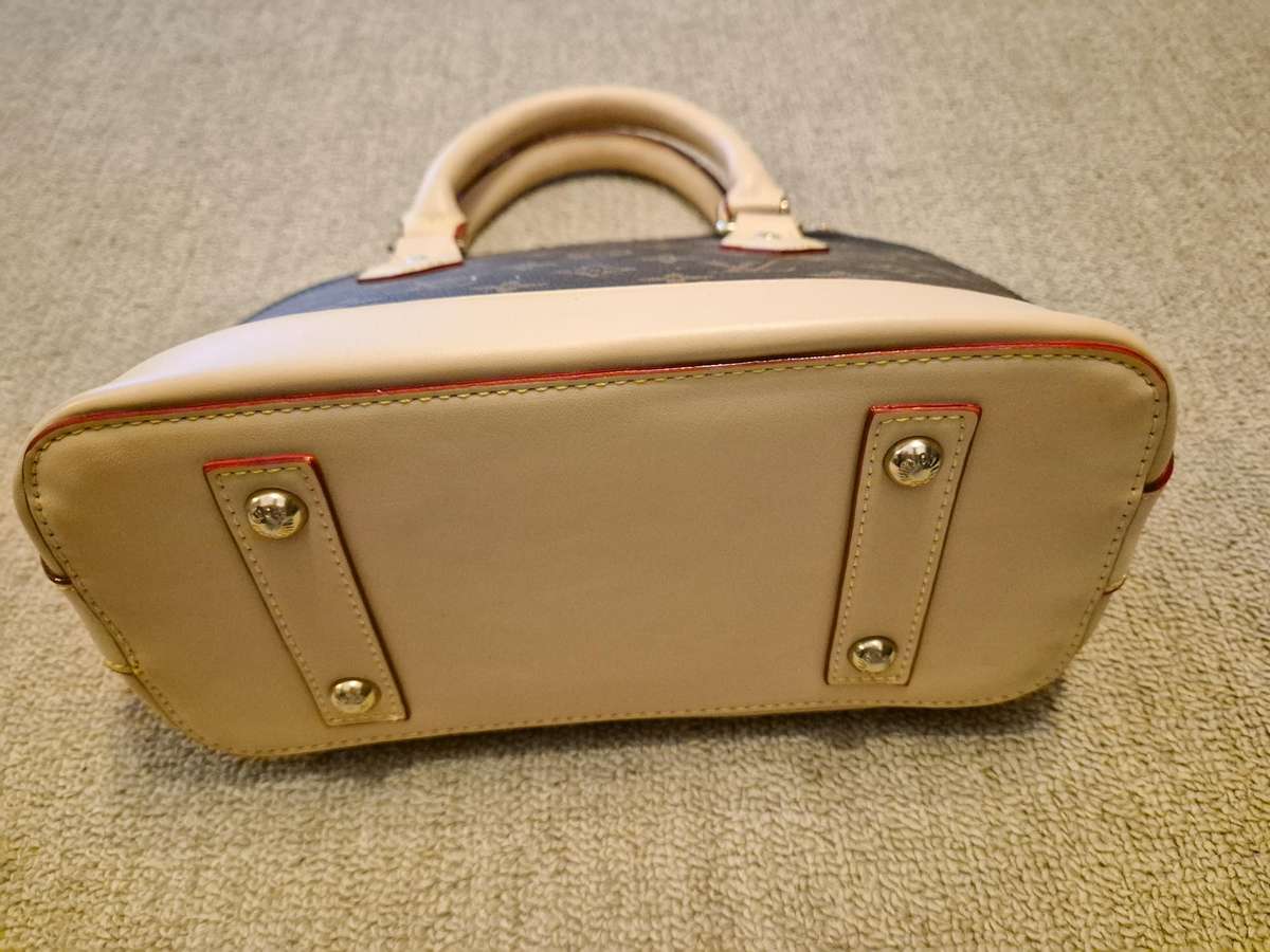 Louis Vuitton Alma BB Monogram Handbag