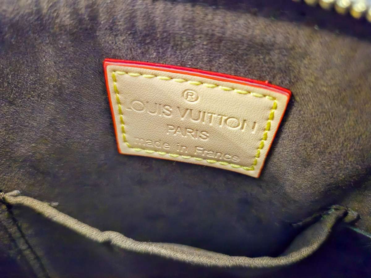 Louis Vuitton Alma BB Monogram Handbag