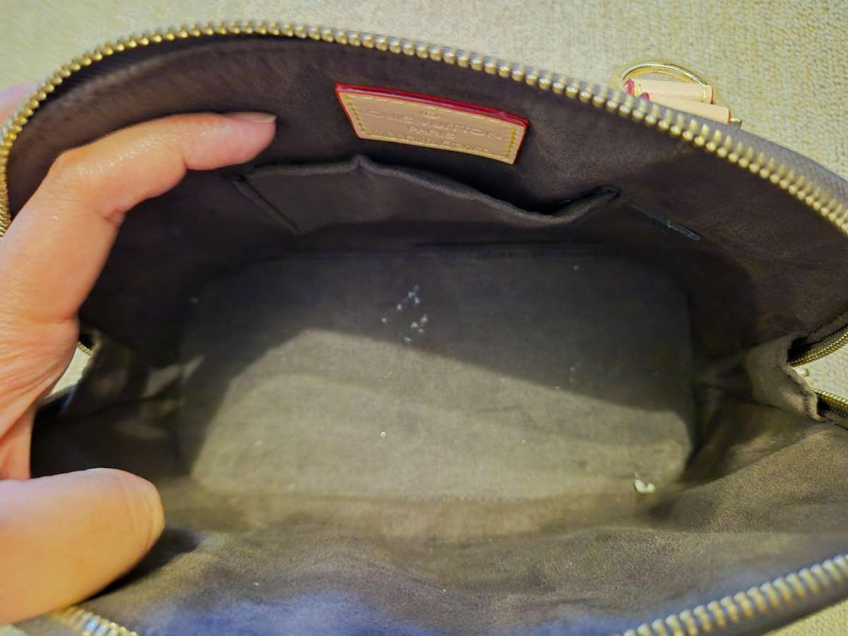 Louis Vuitton Alma BB Monogram Handbag