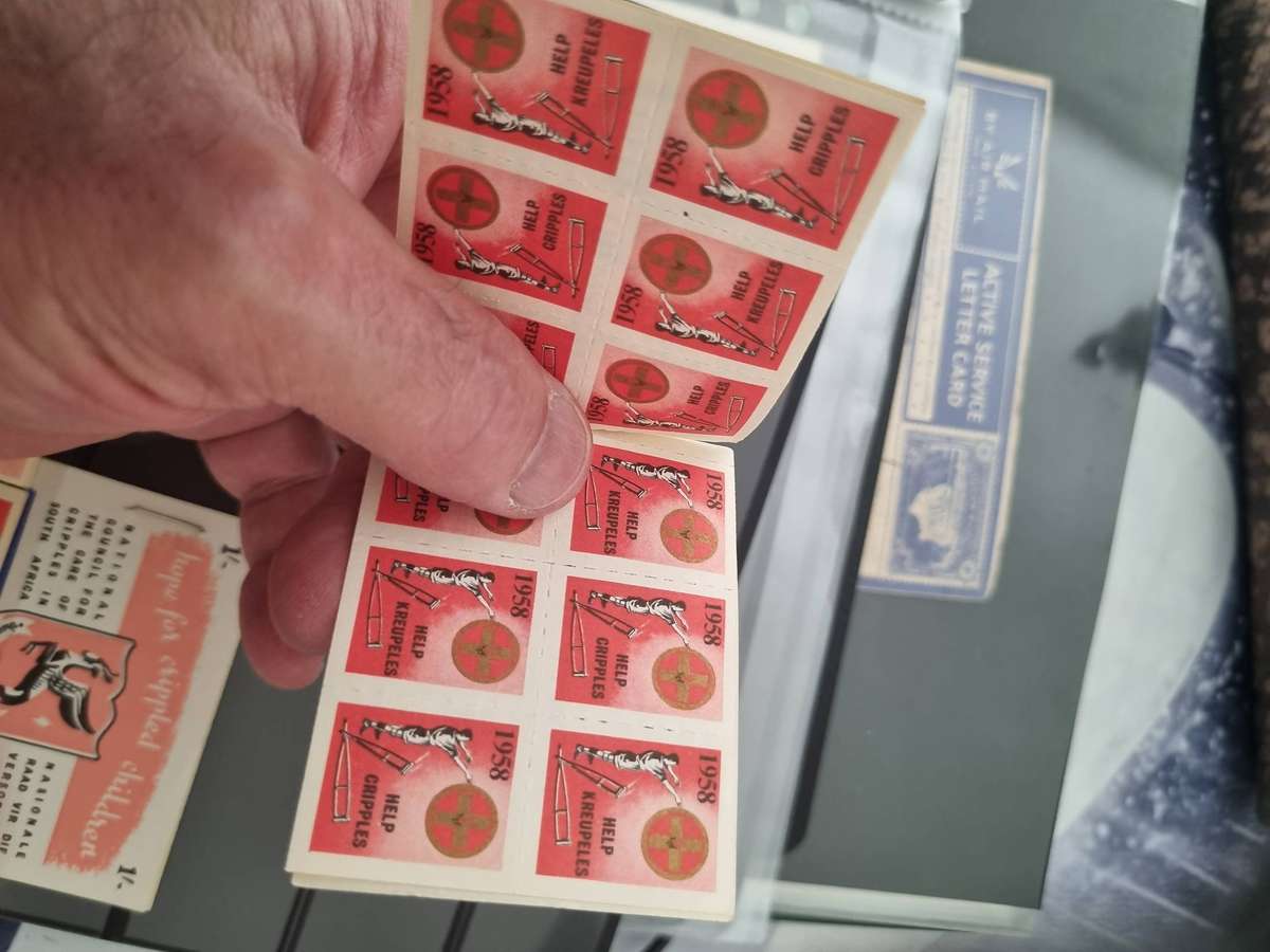 4 different Cinderella "Hope for Crippled Children" charity stamp booklets. All 1 shilling booklets.