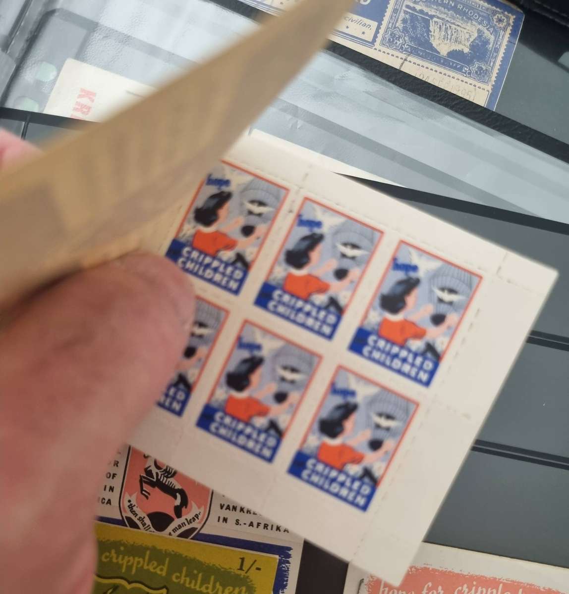 4 different Cinderella "Hope for Crippled Children" charity stamp booklets. All 1 shilling booklets.