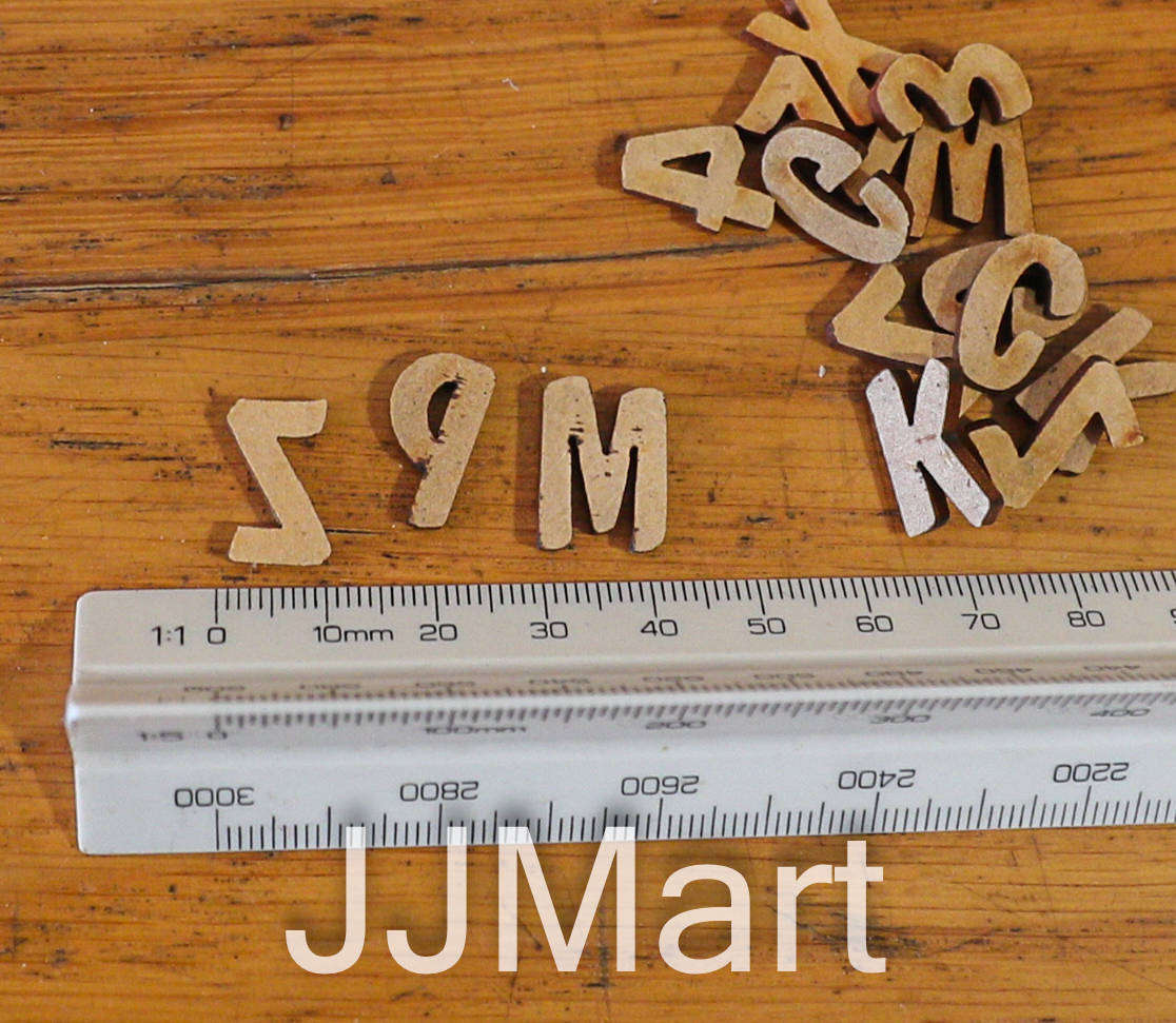 Box of cut out letters and numbers (+/- 1250 in total)