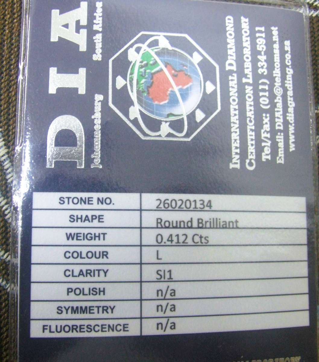 0.412 Carat  colour L Round Natural Diamond,,, WITH FULL DIAMOND REPORT