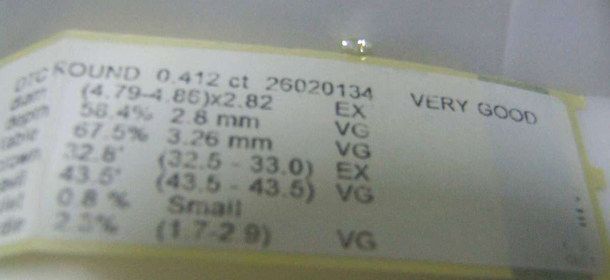 0.412 Carat  colour L Round Natural Diamond,,, WITH FULL DIAMOND REPORT