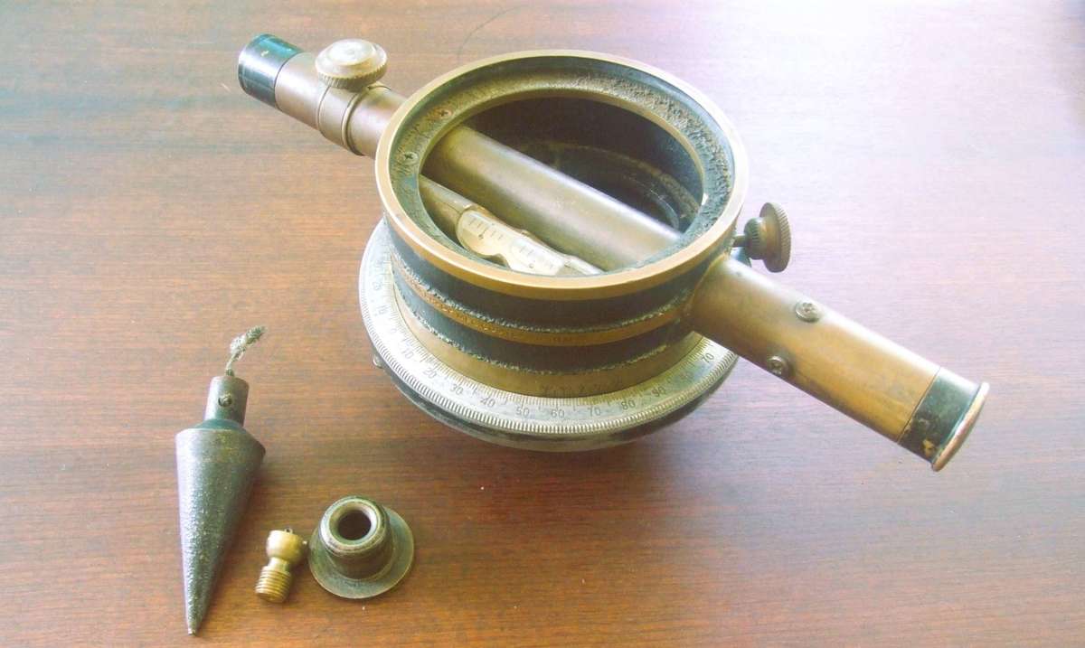 a vintage surveying instrument, specifically identified as a Bostrom Model 4 Contractors Transit Lev