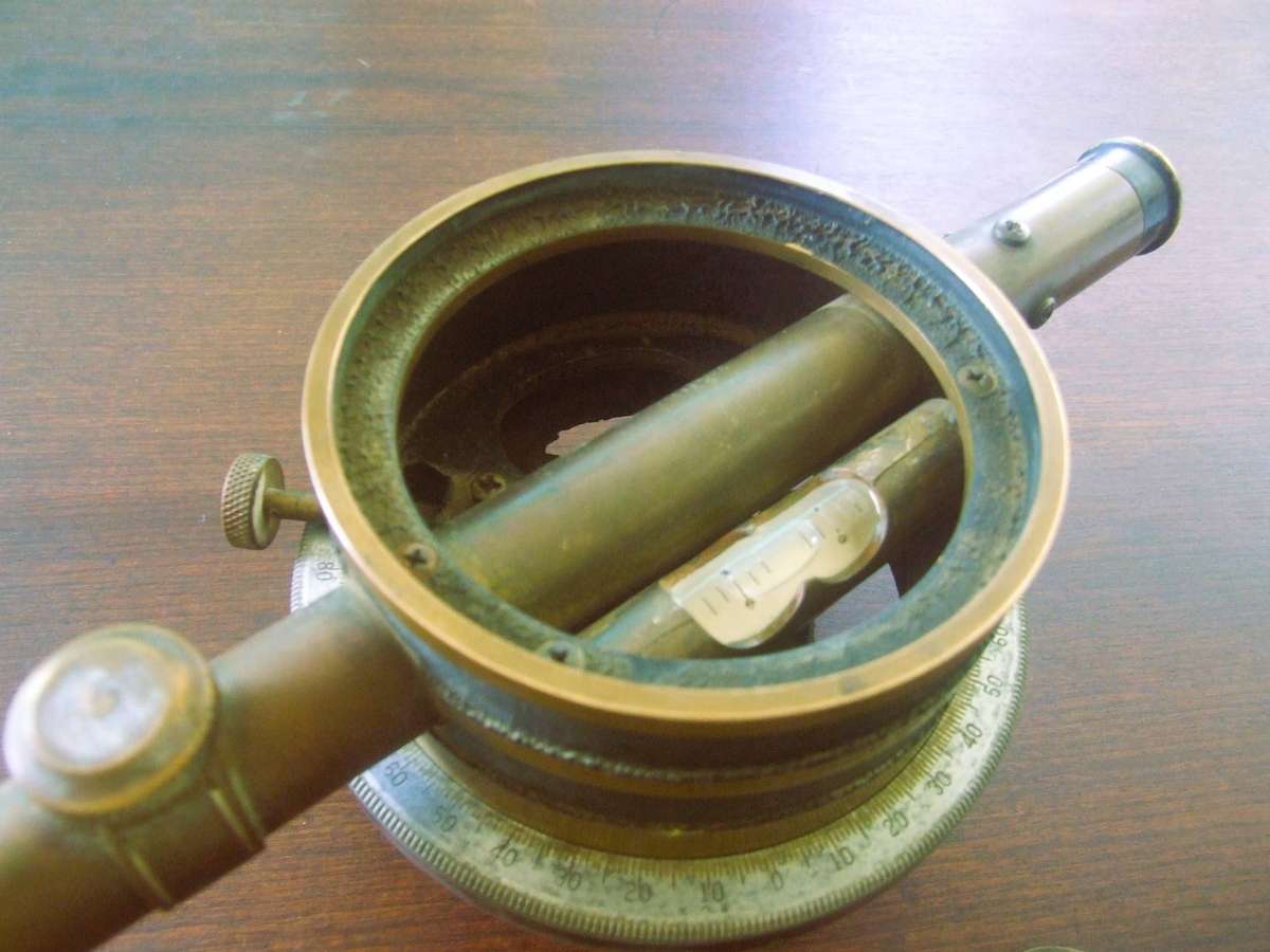 a vintage surveying instrument, specifically identified as a Bostrom Model 4 Contractors Transit Lev
