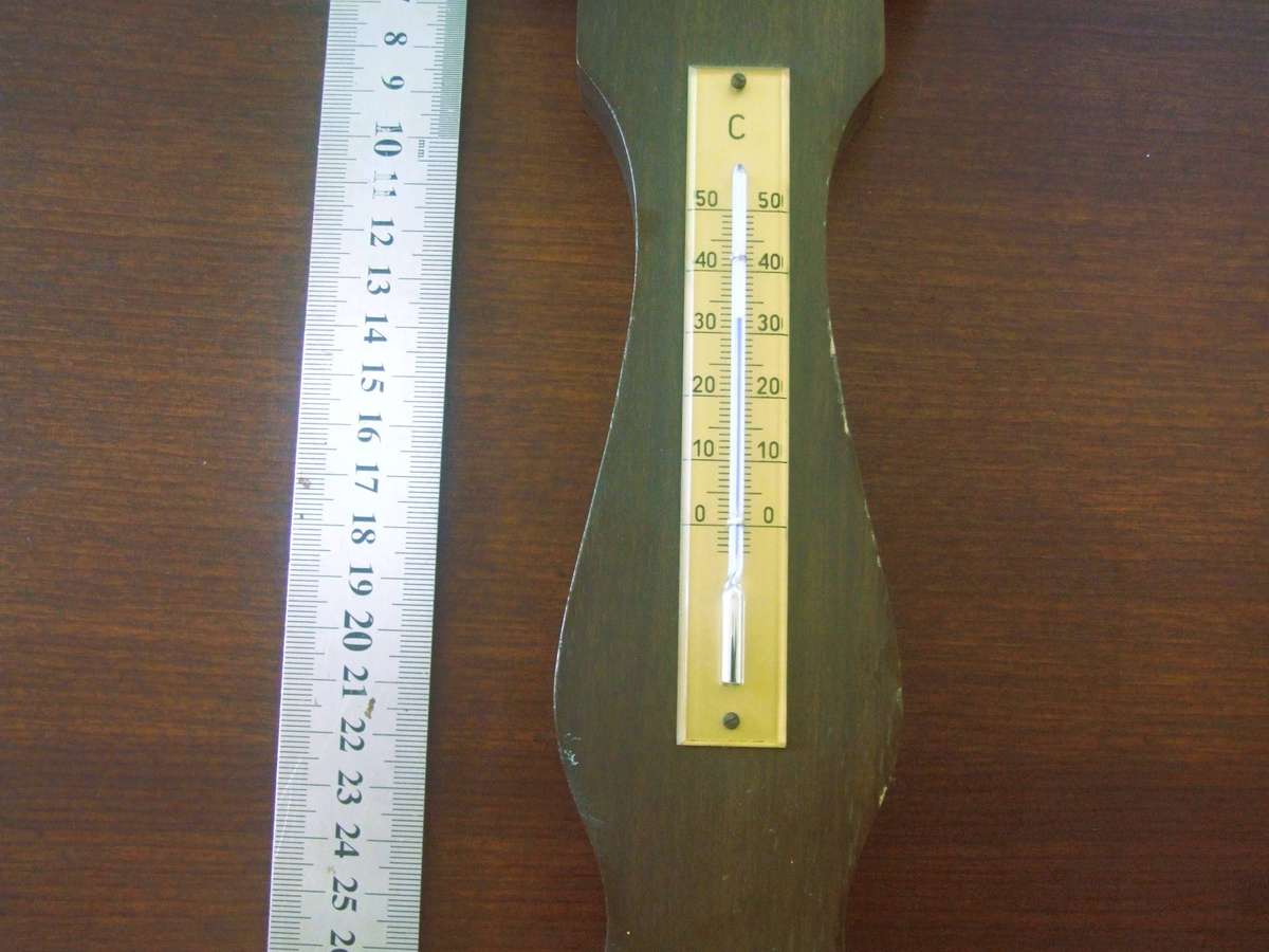 a vintage German-made weather station