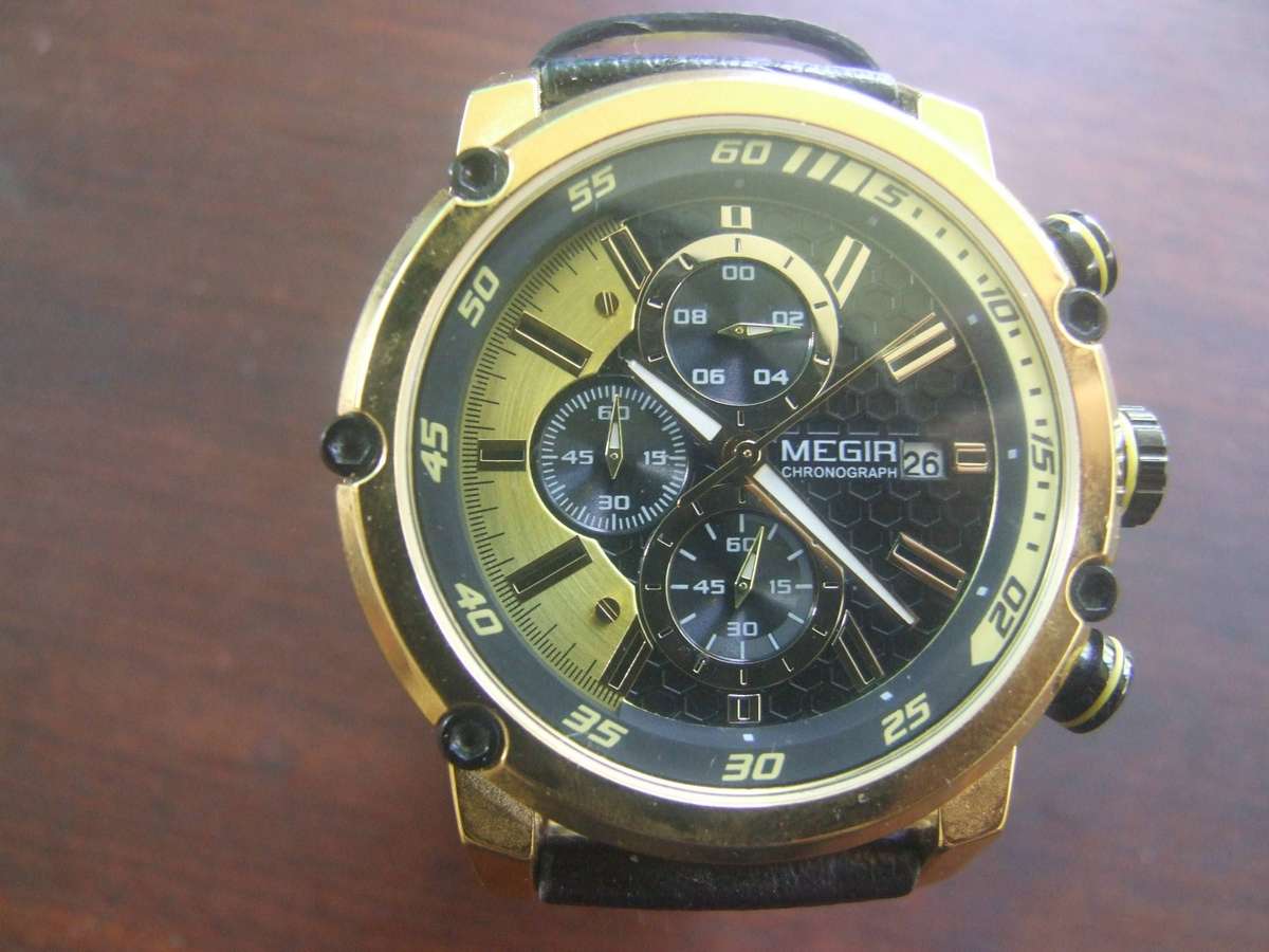 MEGIR Men's Yellow Leather Chronograph Sports Watch, specifically model 2079. It's a bold, functiona