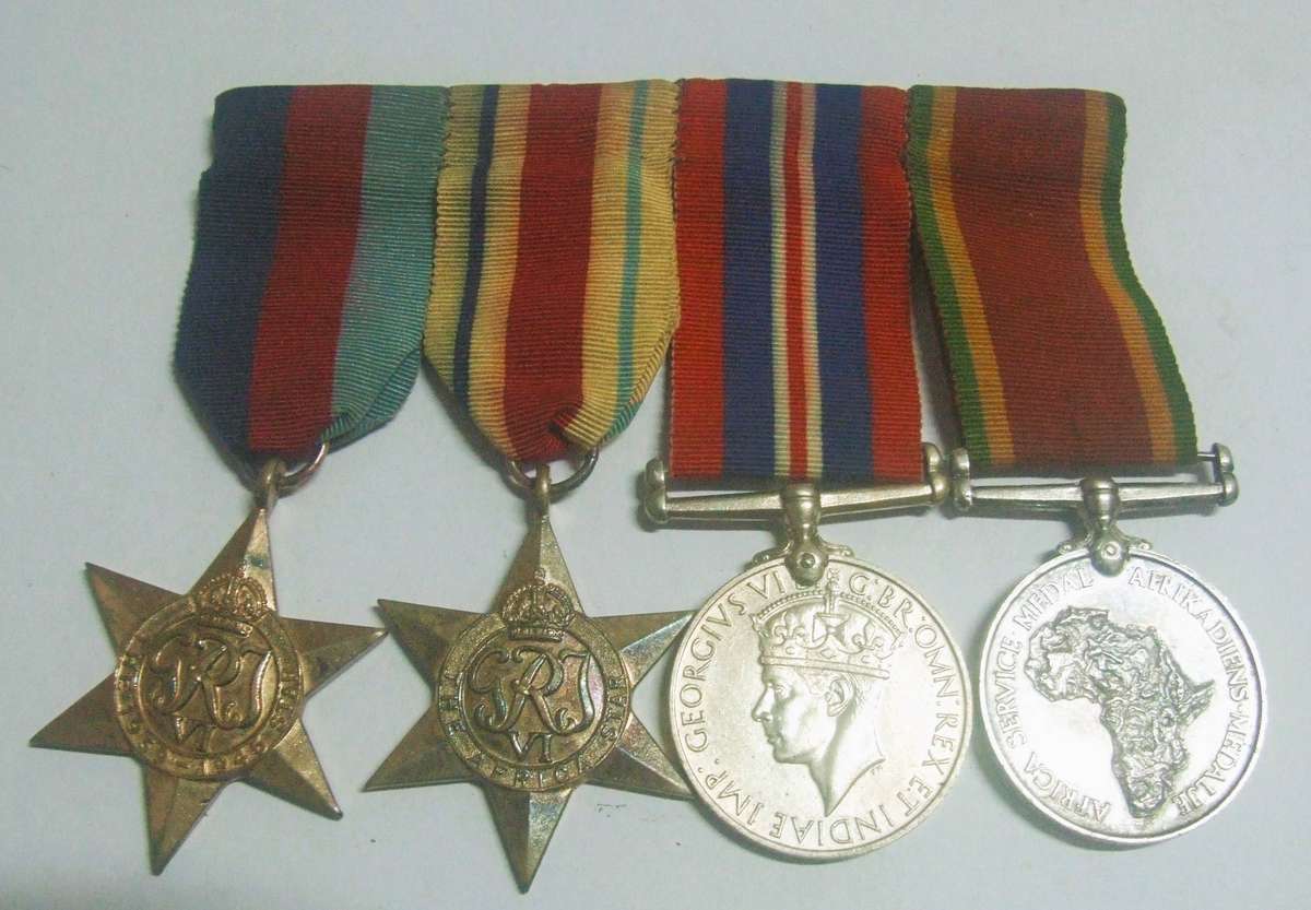 World War II campaign medals belonging to C. E. M. Bellingan. Silver included