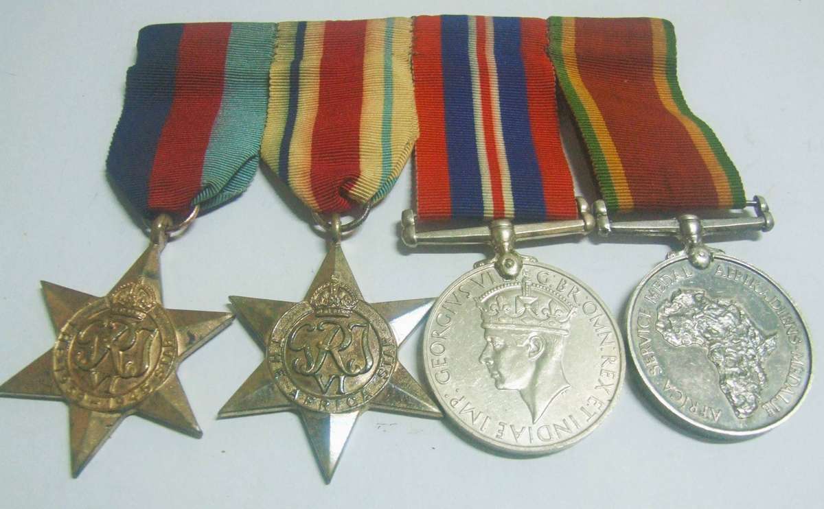 World War II campaign medals belonging to C. E. M. Bellingan. Silver included