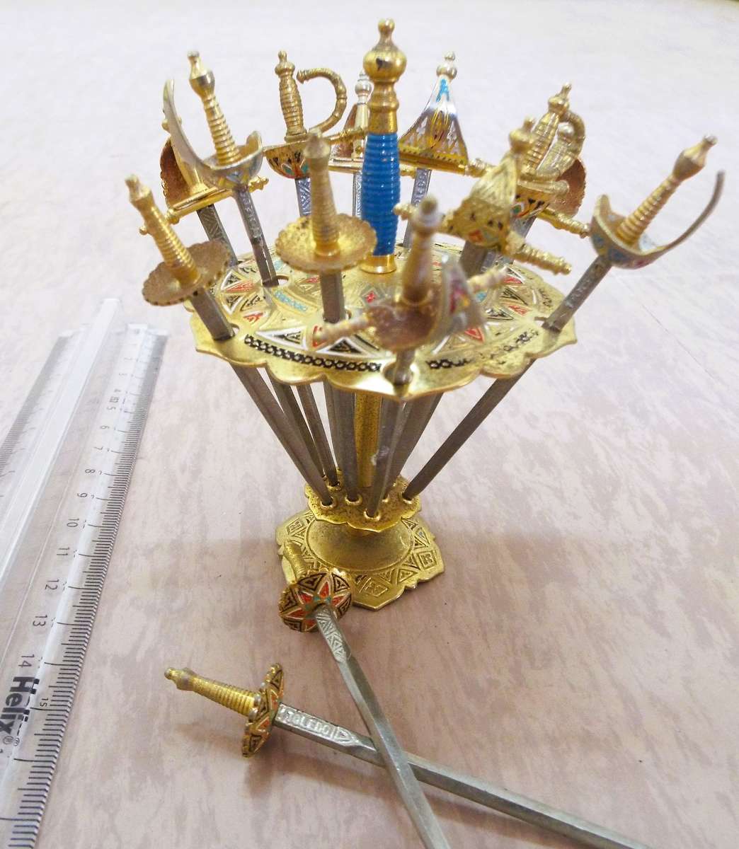 vintage ,,super Nice Toledo mini sword set of 12 plus extra 2 swords