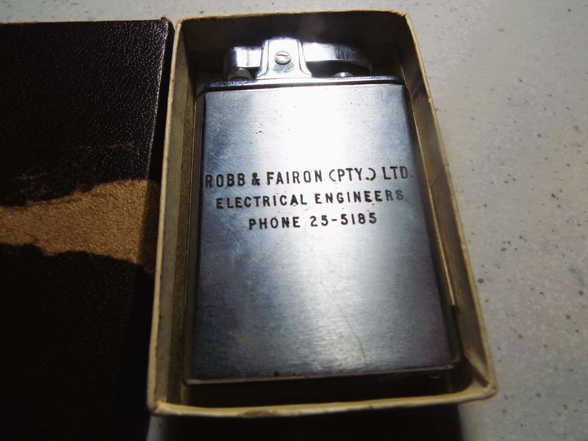 VINTAGE nice unused Robb&Fairon ,lighter with tape measure  ,,,,,in box