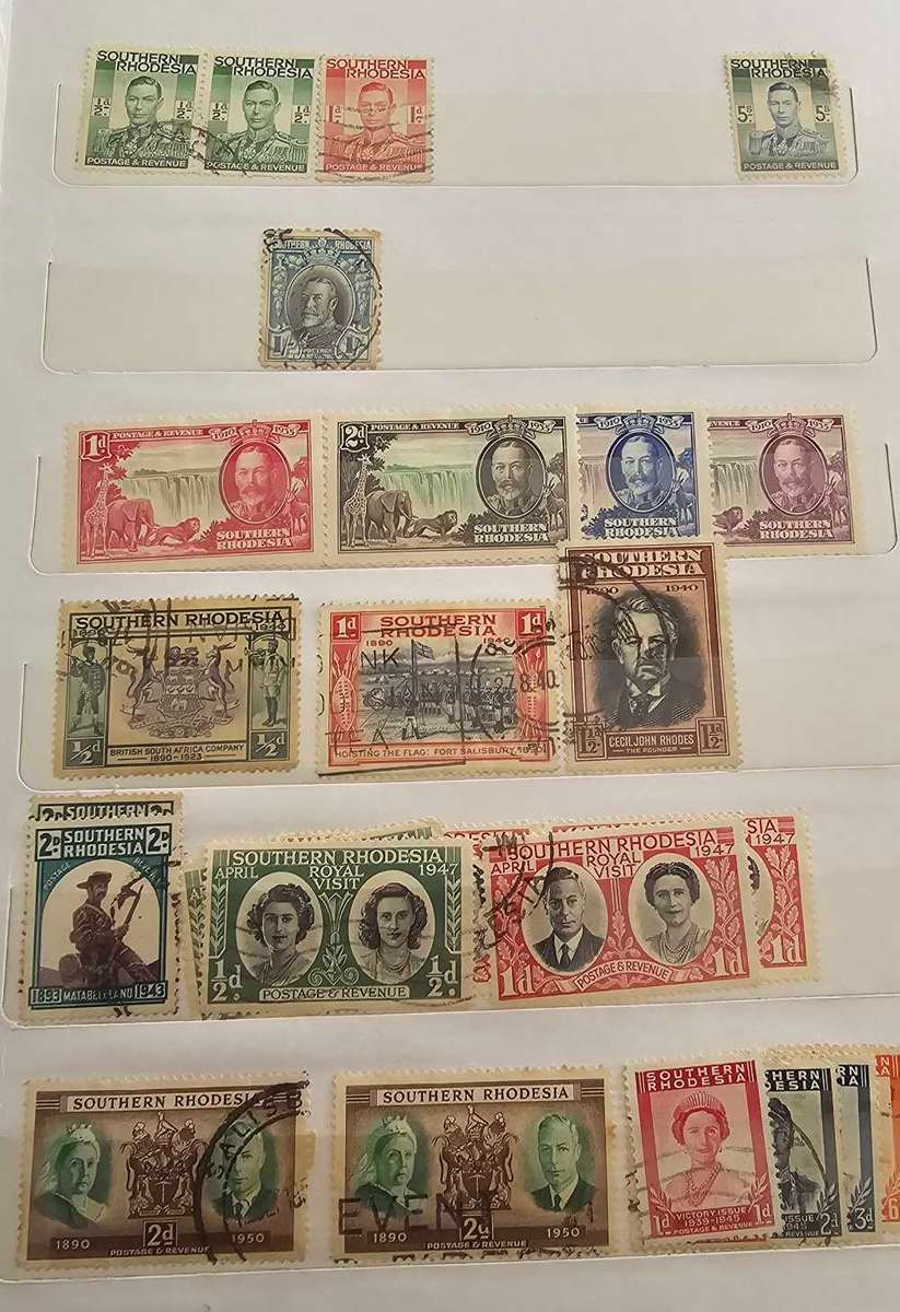 African stamps in abundance with a free album included