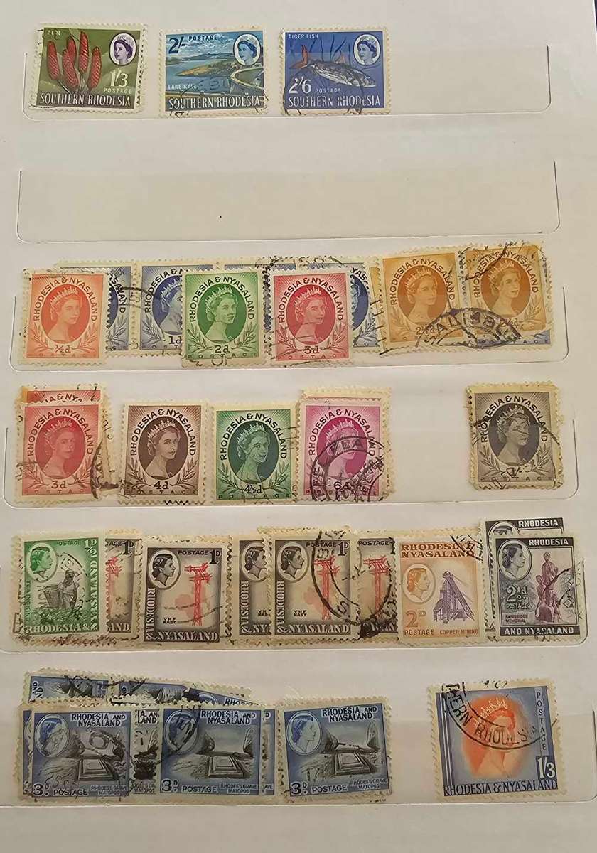 African stamps in abundance with a free album included