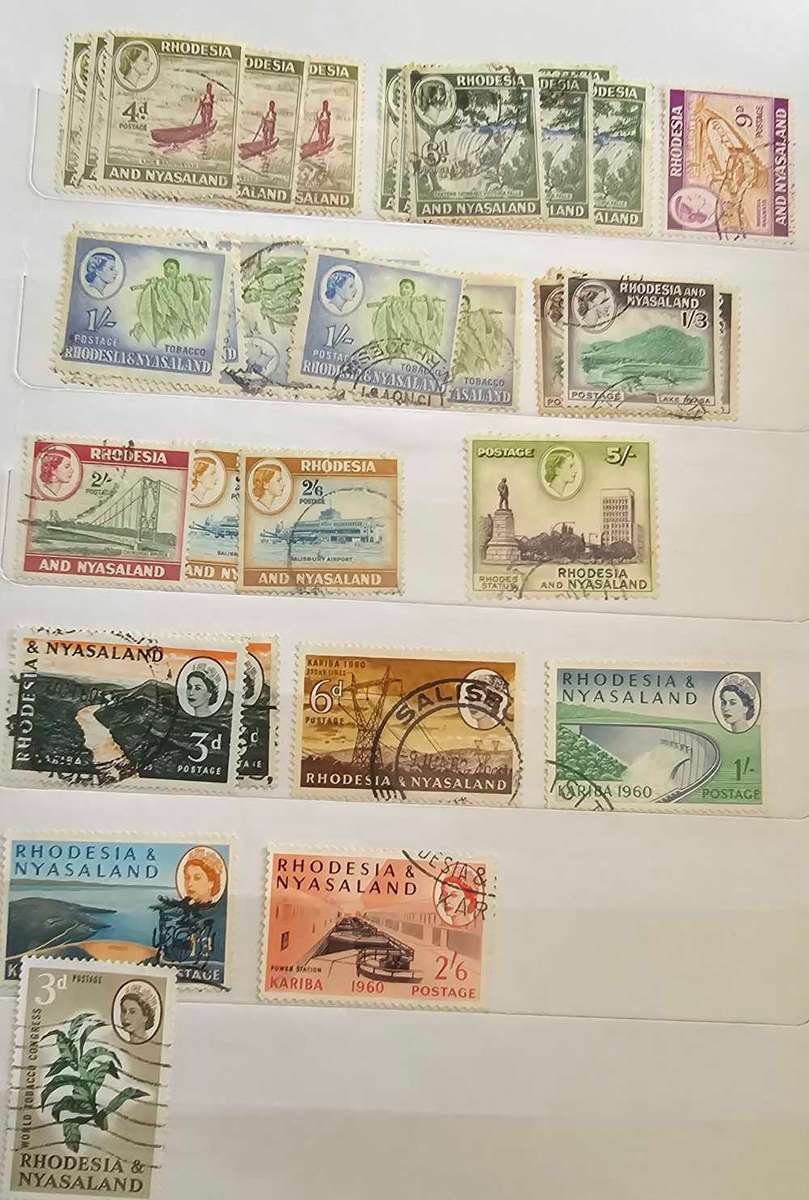 African stamps in abundance with a free album included