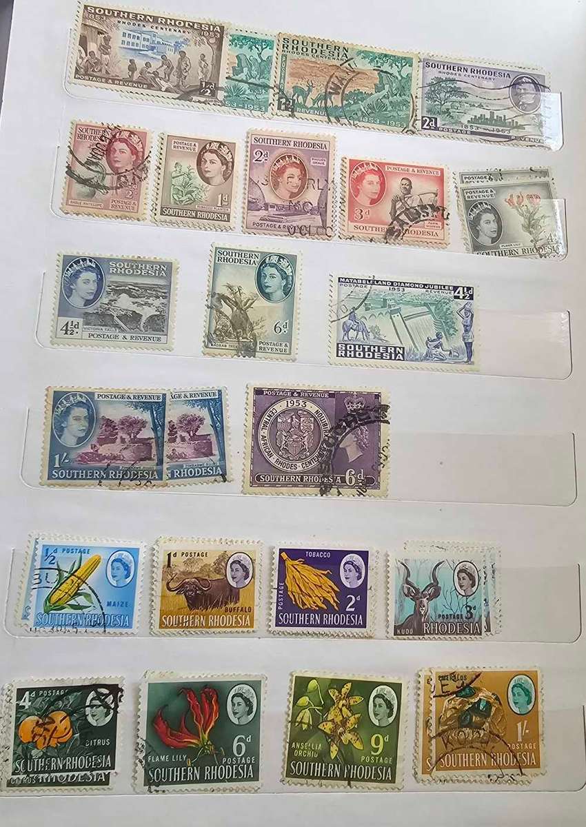 African stamps in abundance with a free album included