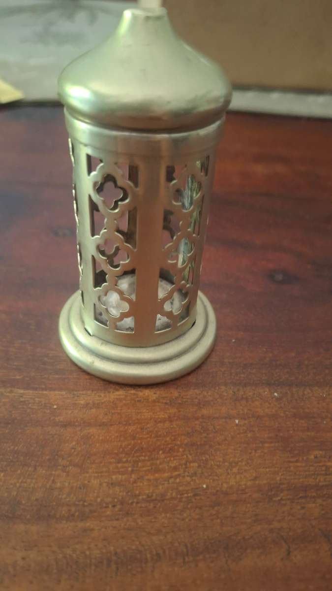 Sterling silver holder with lid