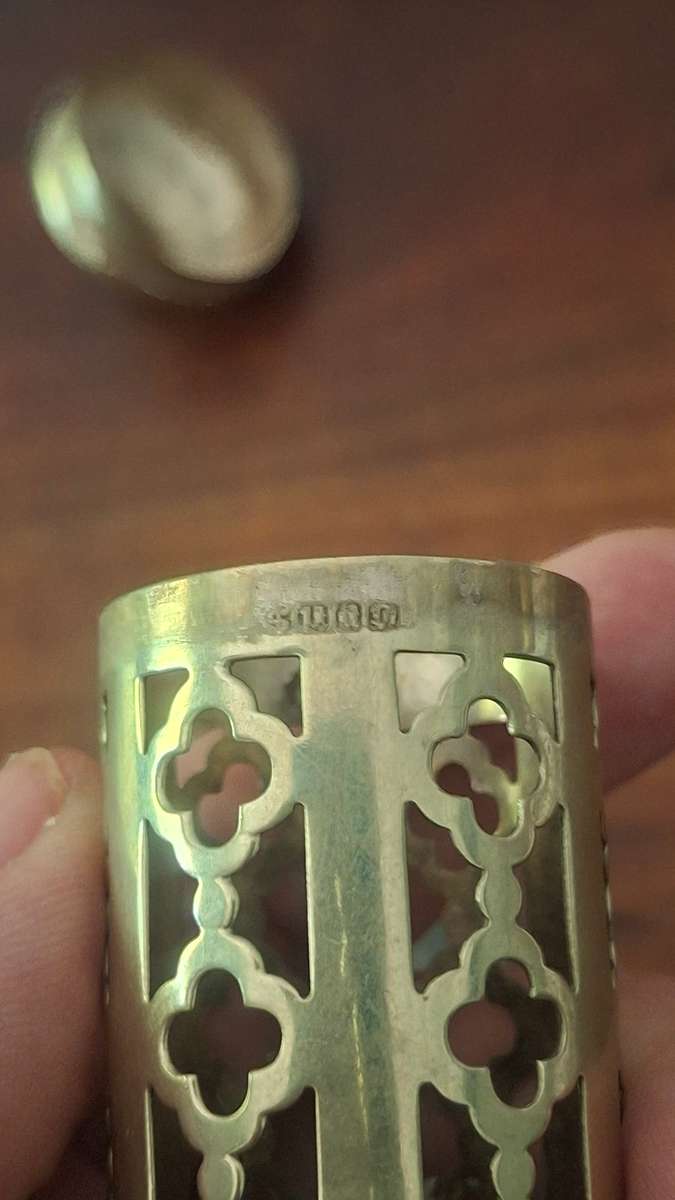 Sterling silver holder with lid