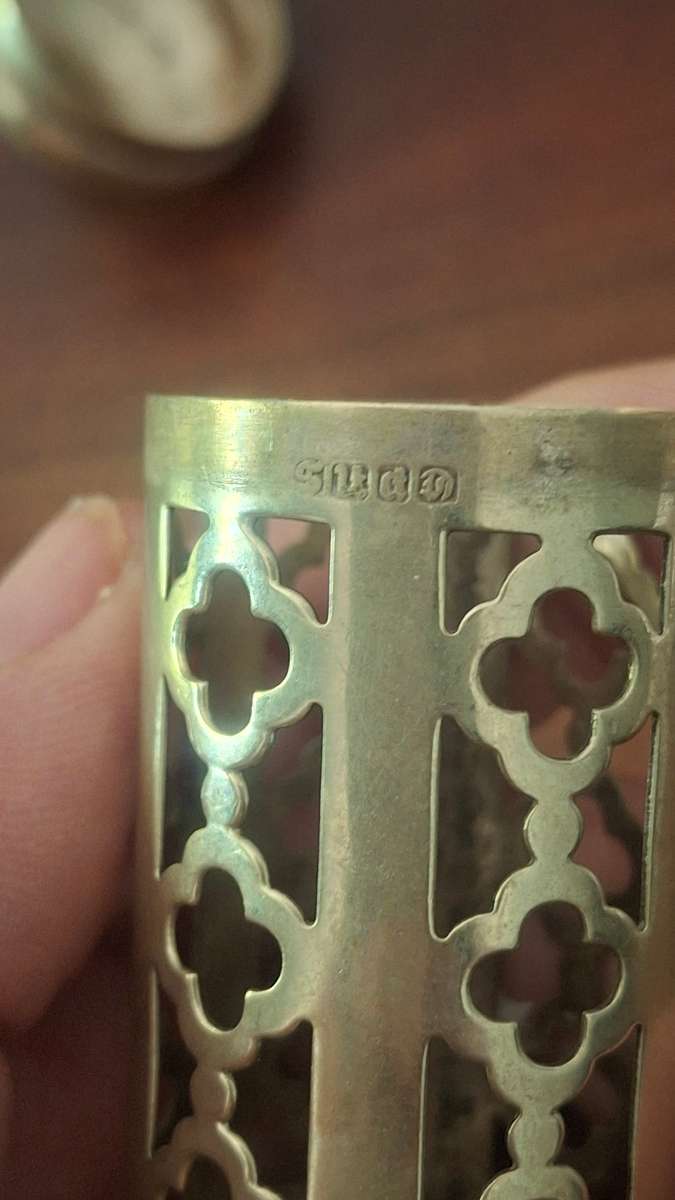 Sterling silver holder with lid