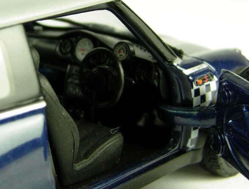 BMW Mini Cooper in Blue Checkmate livery