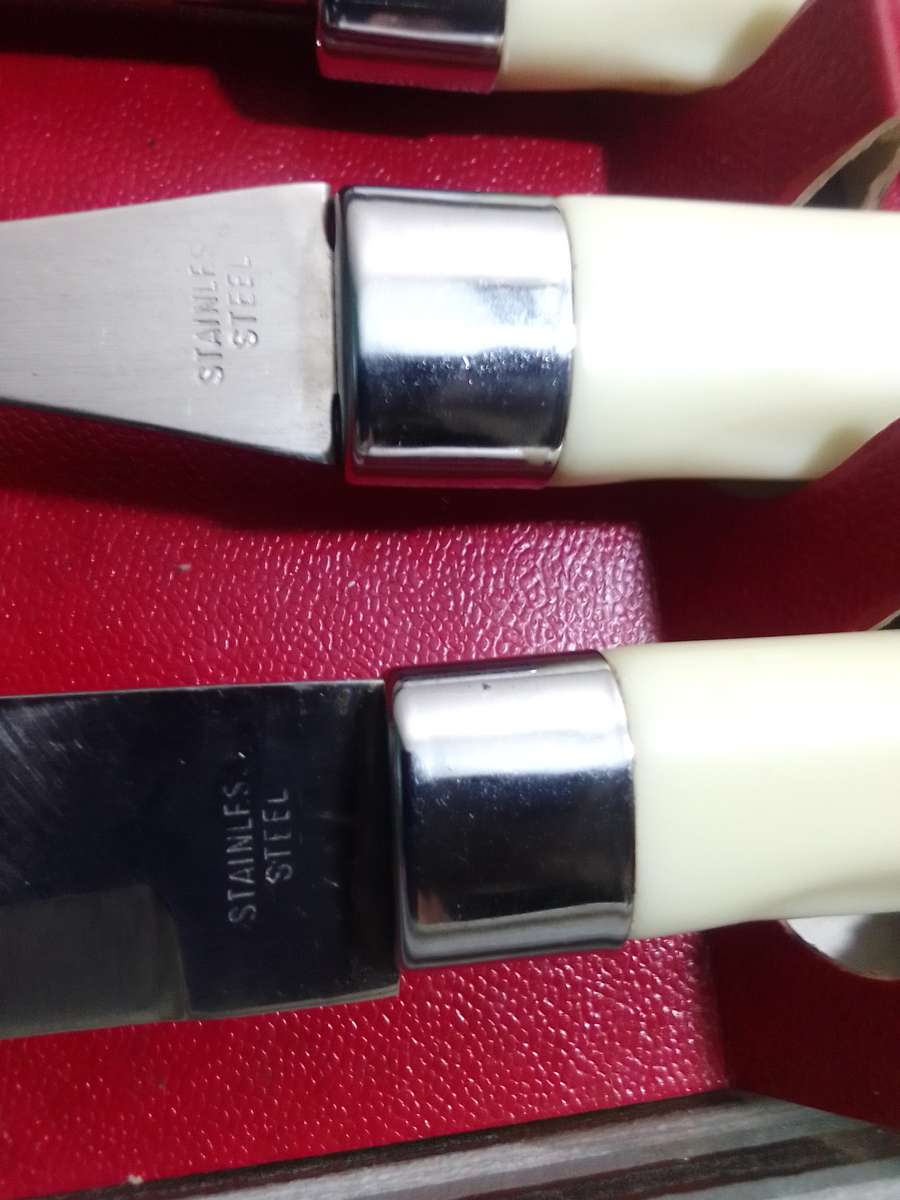 A Wedding present an old vintage Carving Knife Fork Set. Stainless Steel.