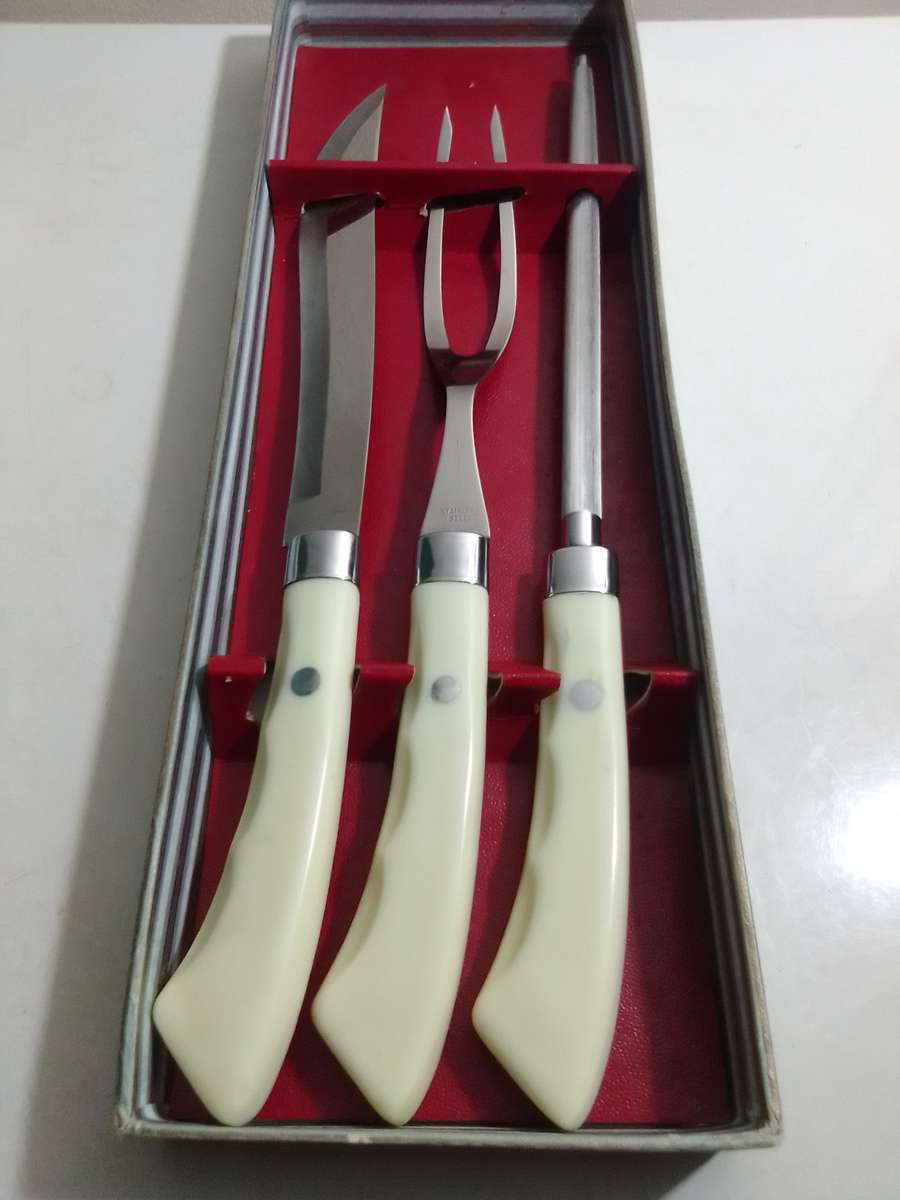 A Wedding present an old vintage Carving Knife Fork Set. Stainless Steel.