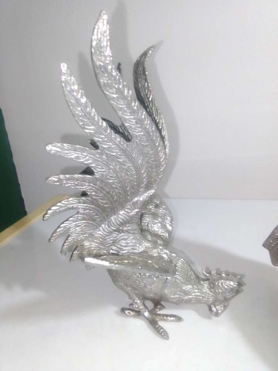 1950's A Vintage pair of fighting roosters. This pair is fierce! Silver plated over cast Brass.