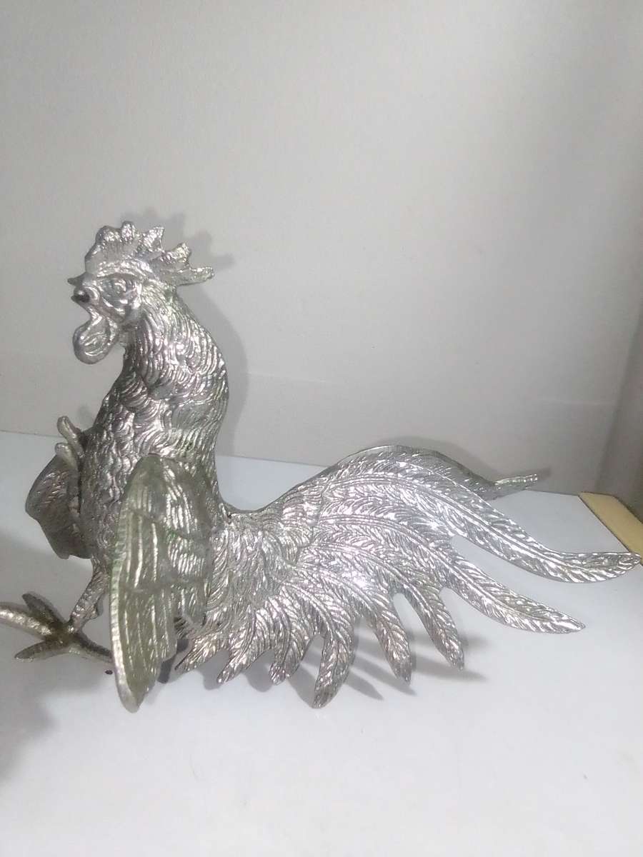 1950's A Vintage pair of fighting roosters. This pair is fierce! Silver plated over cast Brass.