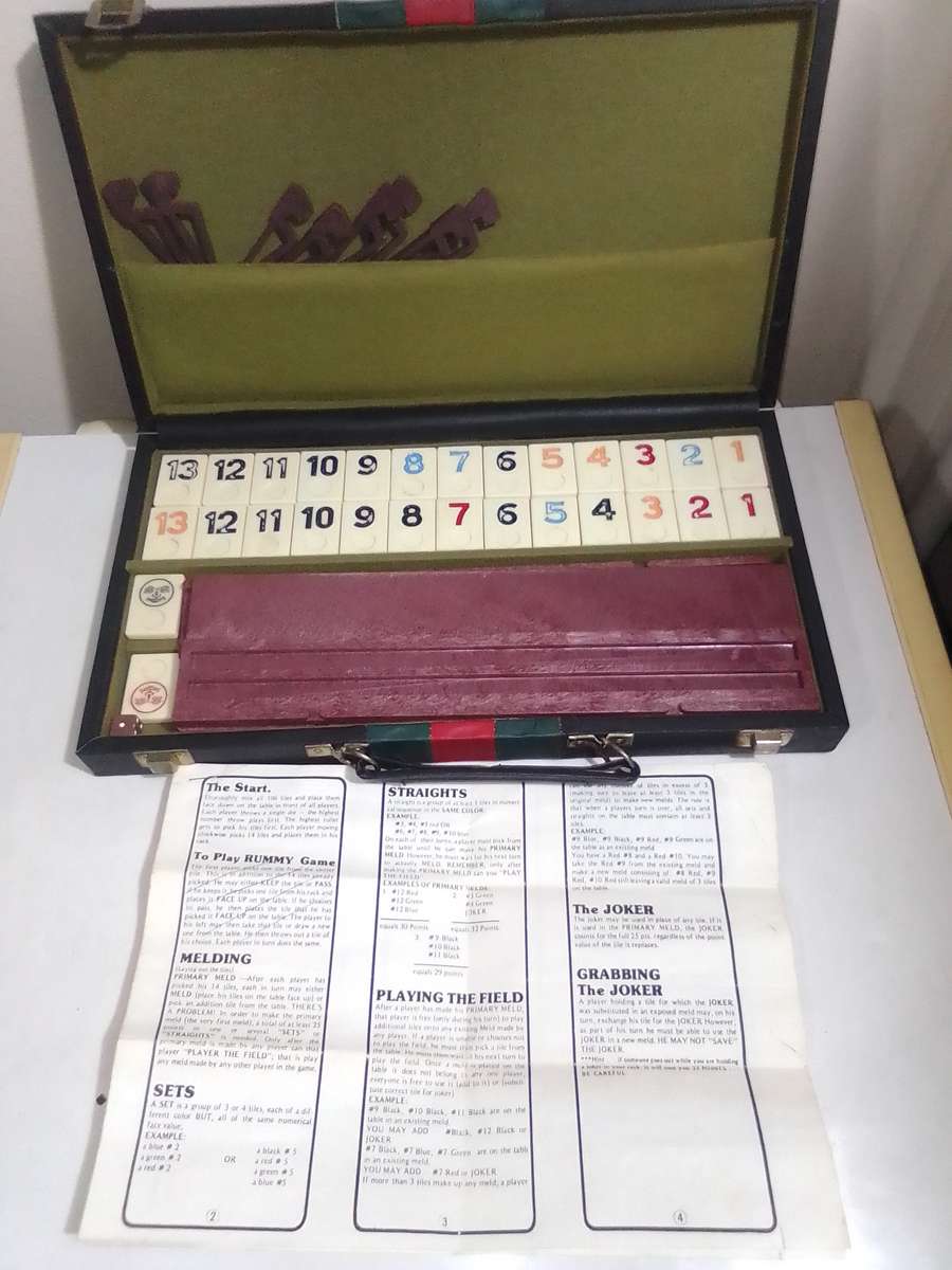 The Hottest Game in Town " Rummy Game " in a case with leaflet.