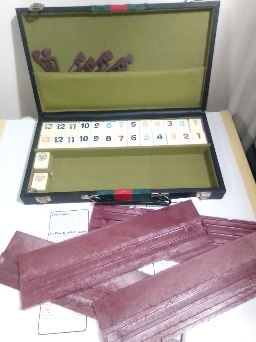 The Hottest Game in Town " Rummy Game " in a case with leaflet.