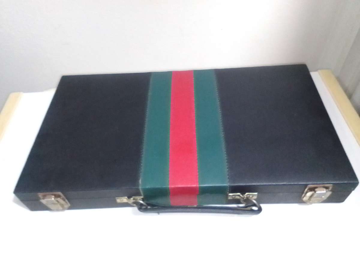 The Hottest Game in Town " Rummy Game " in a case with leaflet.