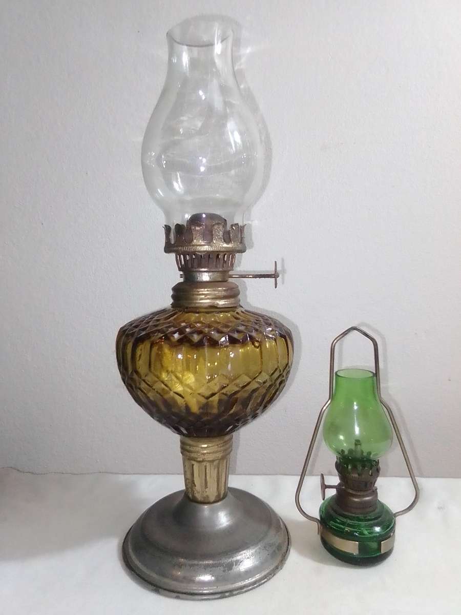 These are very small/mini Amber and green\blue decorative paraffin/kerosene oil lamps.