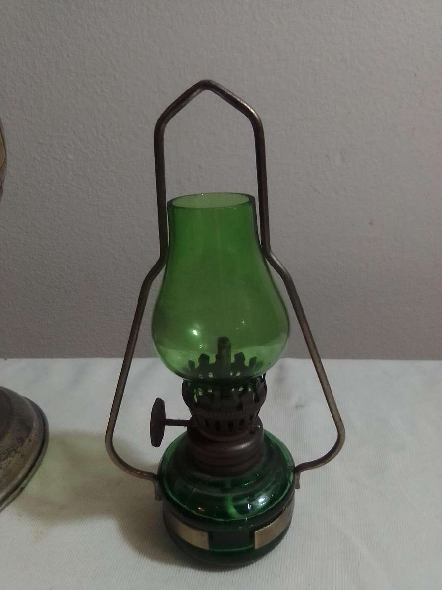 These are very small/mini Amber and green\blue decorative paraffin/kerosene oil lamps.
