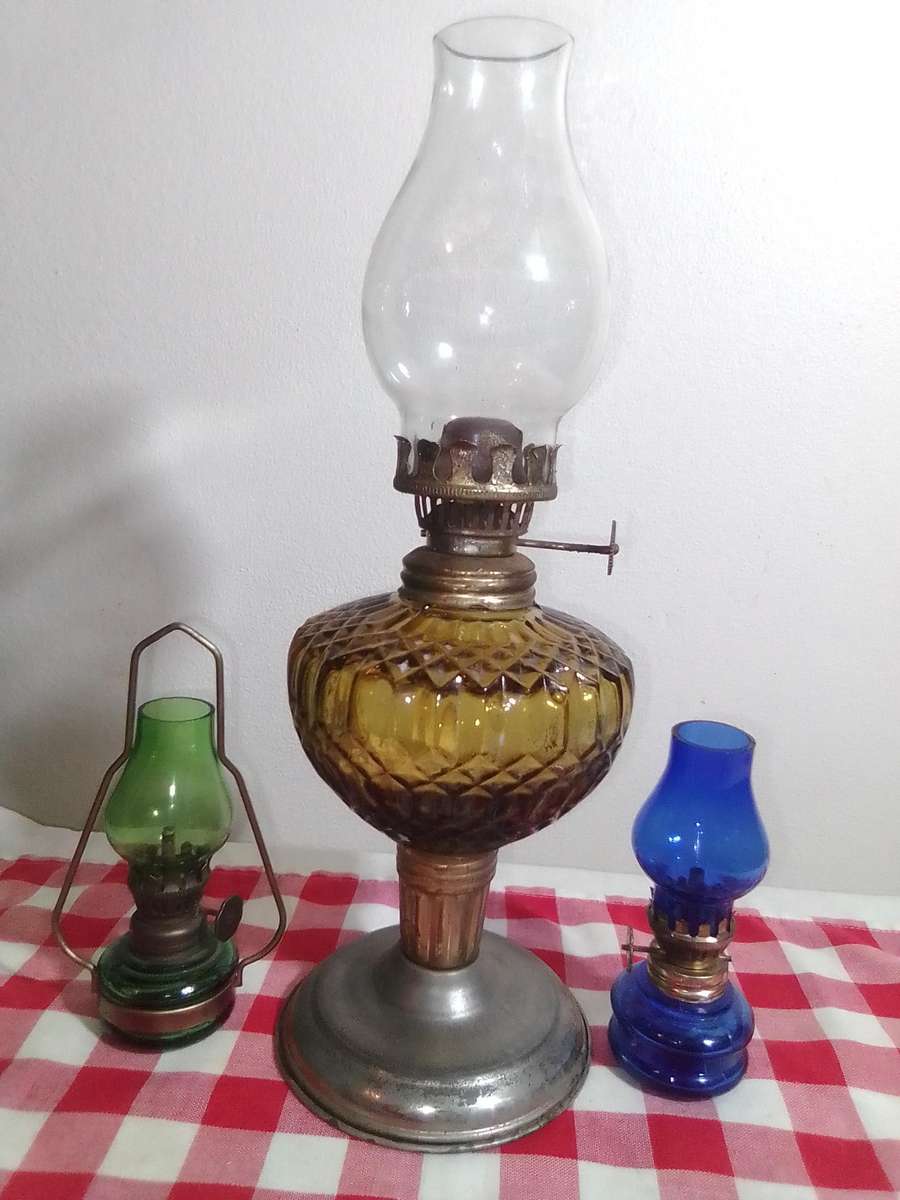 These are very small/mini Amber and green\blue decorative paraffin/kerosene oil lamps.